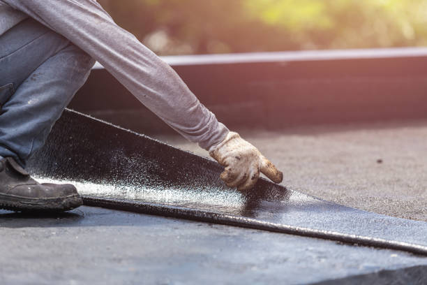 Professional Interior Drainage System technician working in Versailles, PA